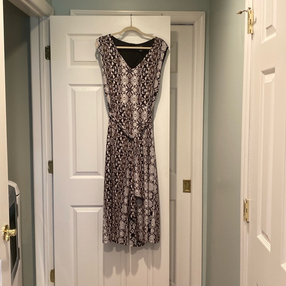 Animal print by Nicole Miller jumpsuit size 10 new with tags.